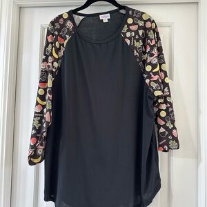 LuLaRoe Randy Top size 3XL color black with printed sleeves